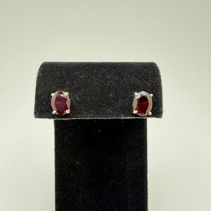 NWOT 9x7 mozambique garnet, oval cut, faceted earring studs in sterling silver!